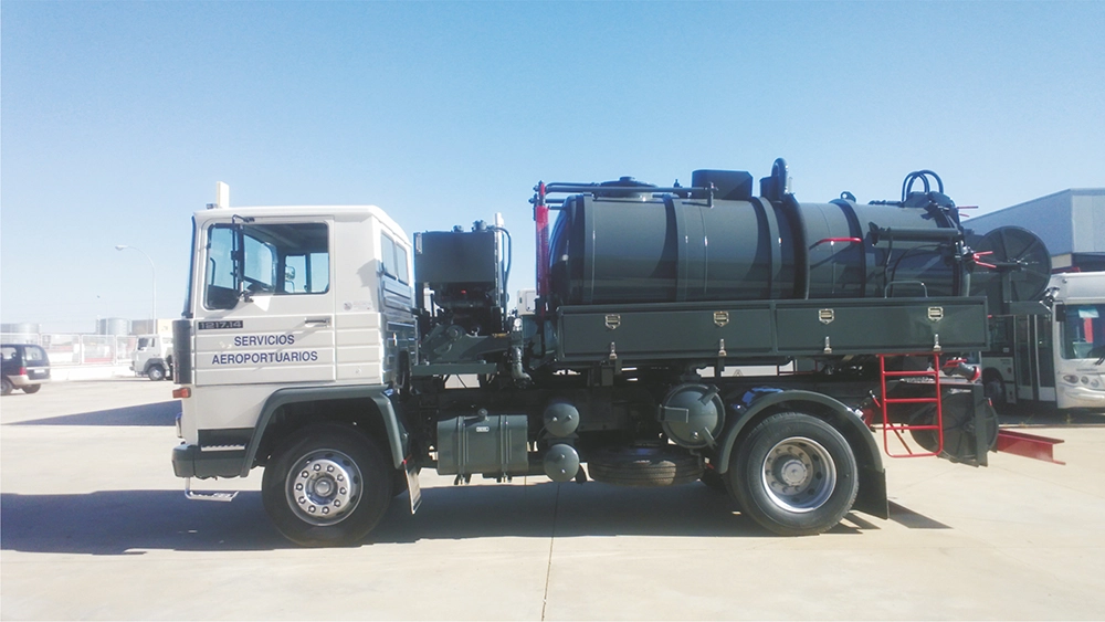 Cesspool cleaning tanker with rebuilt engine